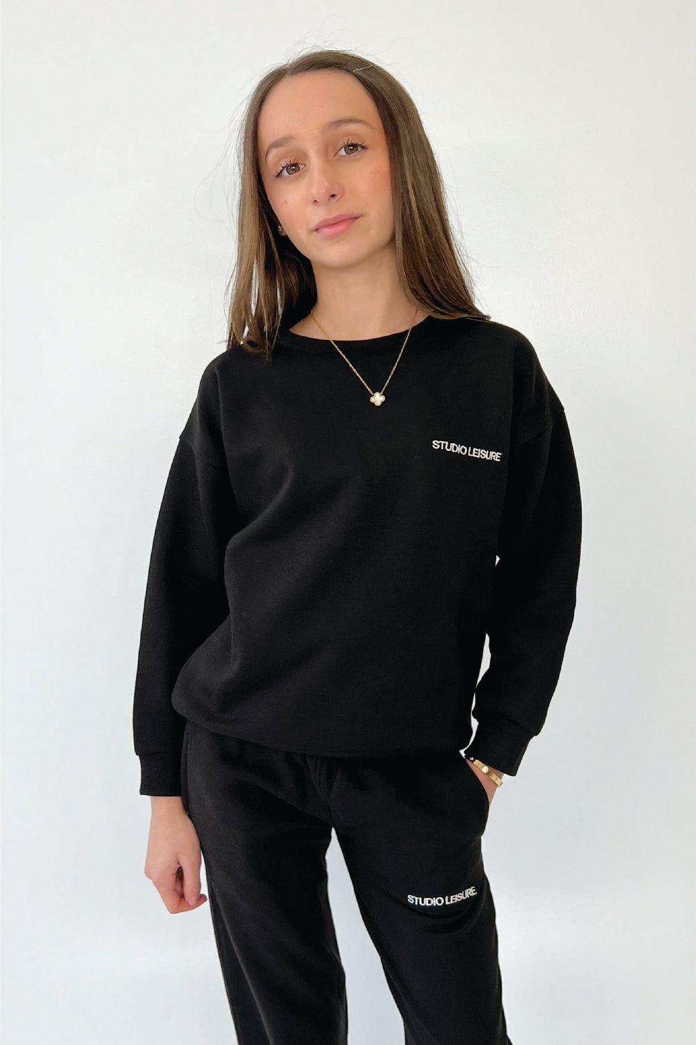 Mini studio leisure essential black embroidered sweater